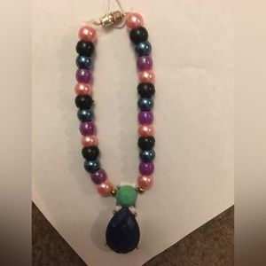 This bracelet is made of string